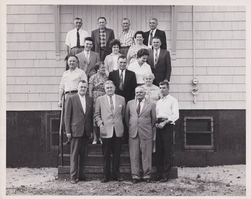 Croatian immigrants pose on the steps of the Croatian Hall.